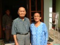 My grandfather with his wife. He wasn′t angry, the sun was blinding them :)